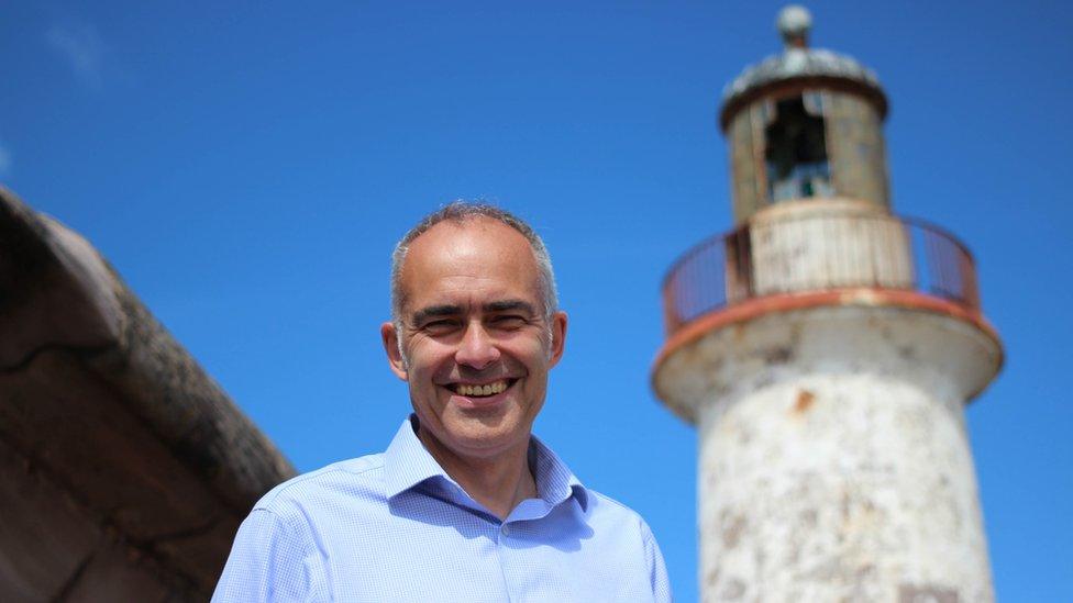 John Baker with west lighthouse