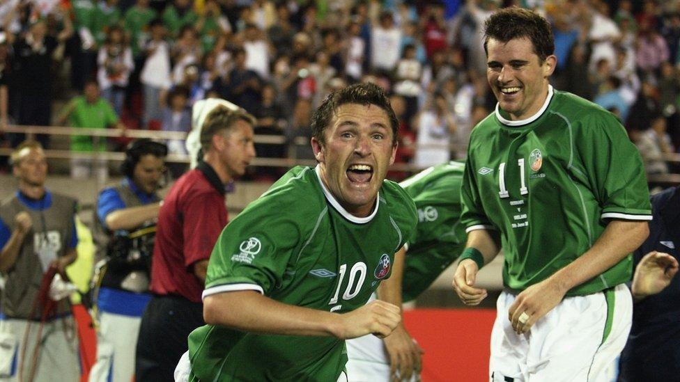 Republic of Ireland's Robbie Keane celebrates with Kevin Kilbane at the World Cup in 2002