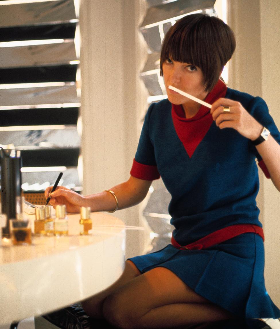 The fashion designer Mary Quant is seen at work in her studio.