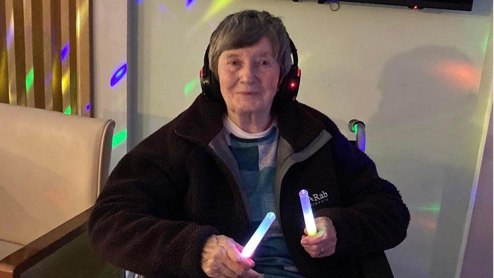 Judi with glow sticks