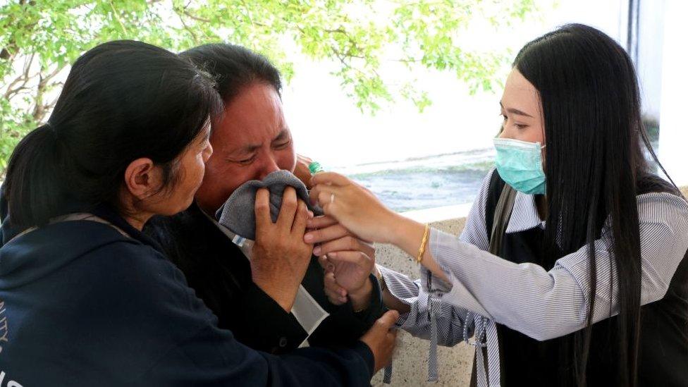 A relative of a civil defence volunteer, who was killed in an attack by suspected Muslim militants