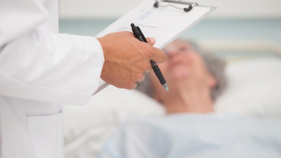 A doctor with clipboard