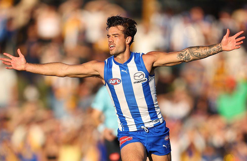 Jy Simpkin of the Kangaroos celebrates a goal against the West Coast Eagles at the Hands Oval in Bunbury, Australia. Photo by Paul Kane