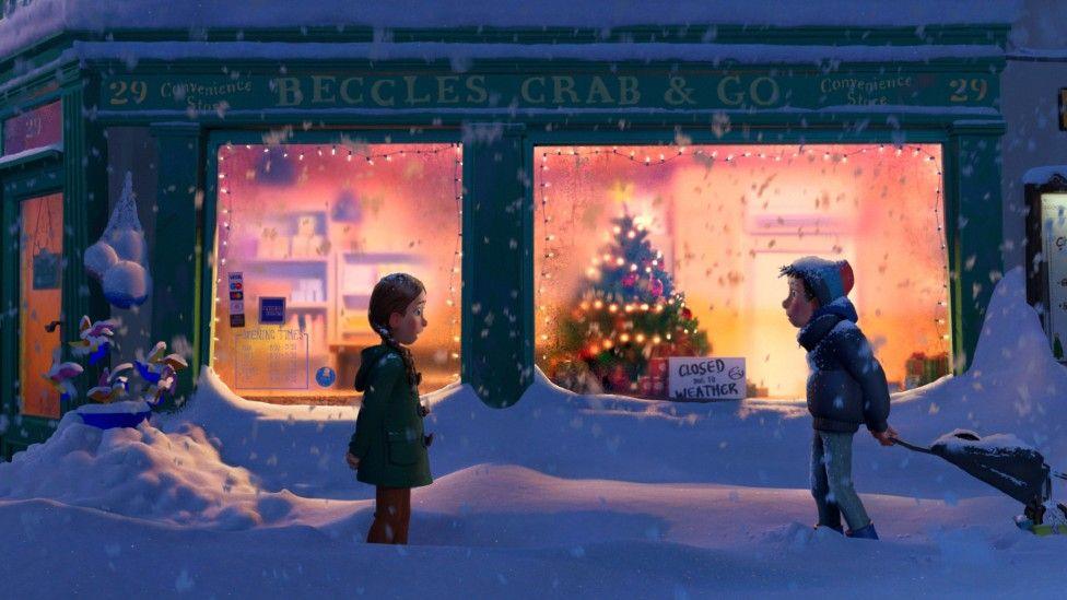 An image from That Christmas in front of Beccles Crab and Go store. There are two characters facing each other, a boy and a girl (or man and woman). It is snowing heavily and it is dark.