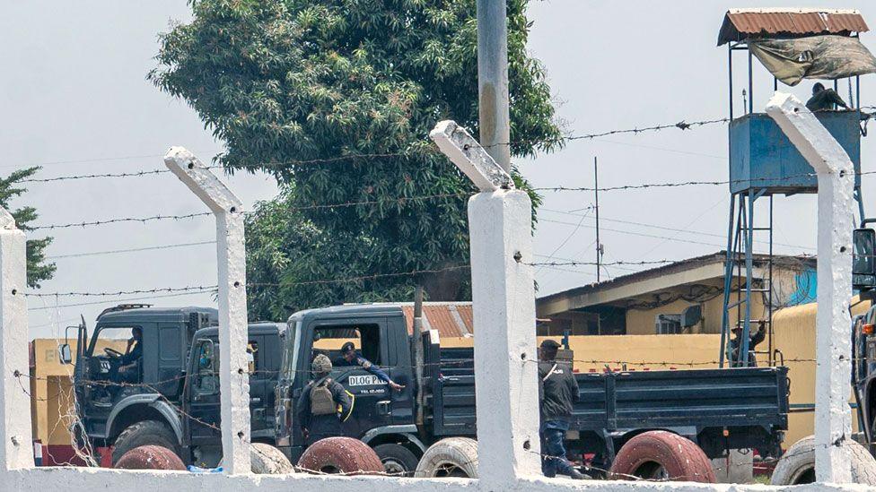 Security vehicles and a security tower at Makala Prison in Kinshasa, DR Congo - September 2024