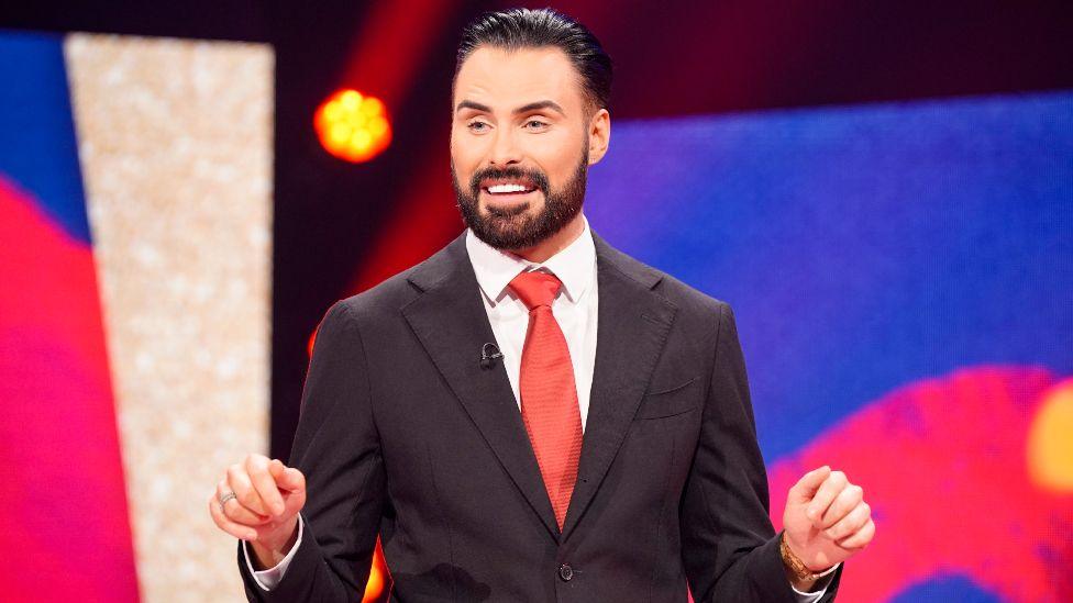 Rylan Clark on stage presenting Comic Relief 2025