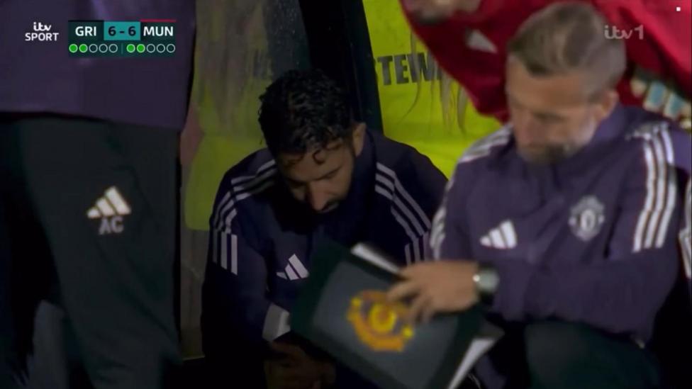 Man Utd boss Ruben Amorim in the dugout during the match against Grimsby