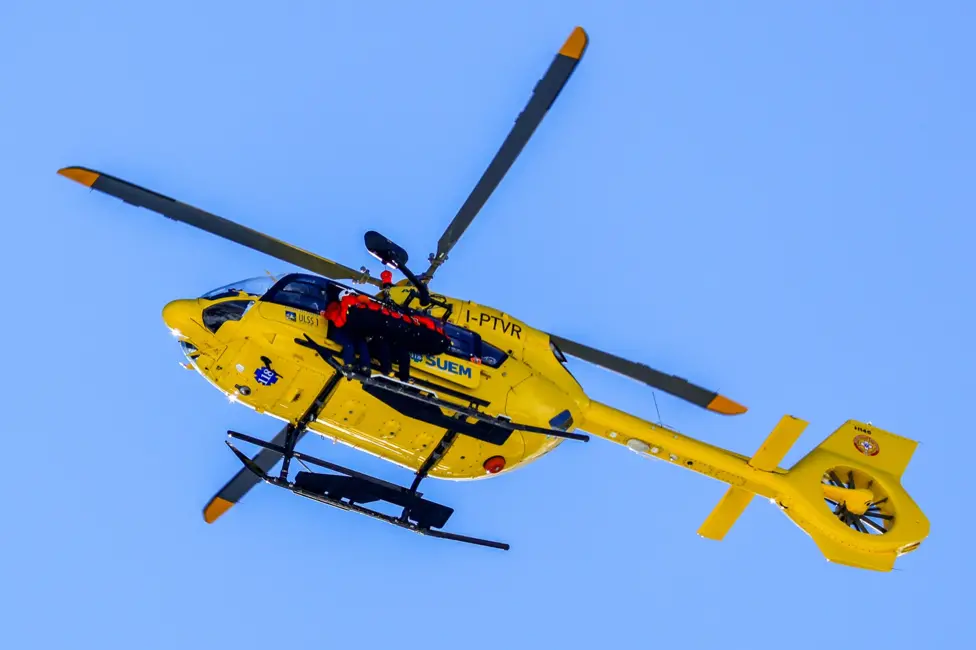 Lindsey Vonn is airlifted off the piste after crashing out of the women's downhill skiing