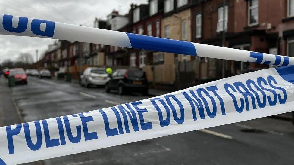 A police cordon on Brown Hill Terrace in Harehills after a woman's body was found on 12 February