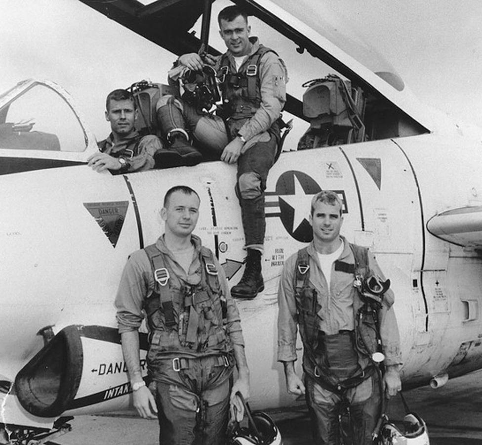 John McCain with Squadron members and a North American T-2 "Buckeye".