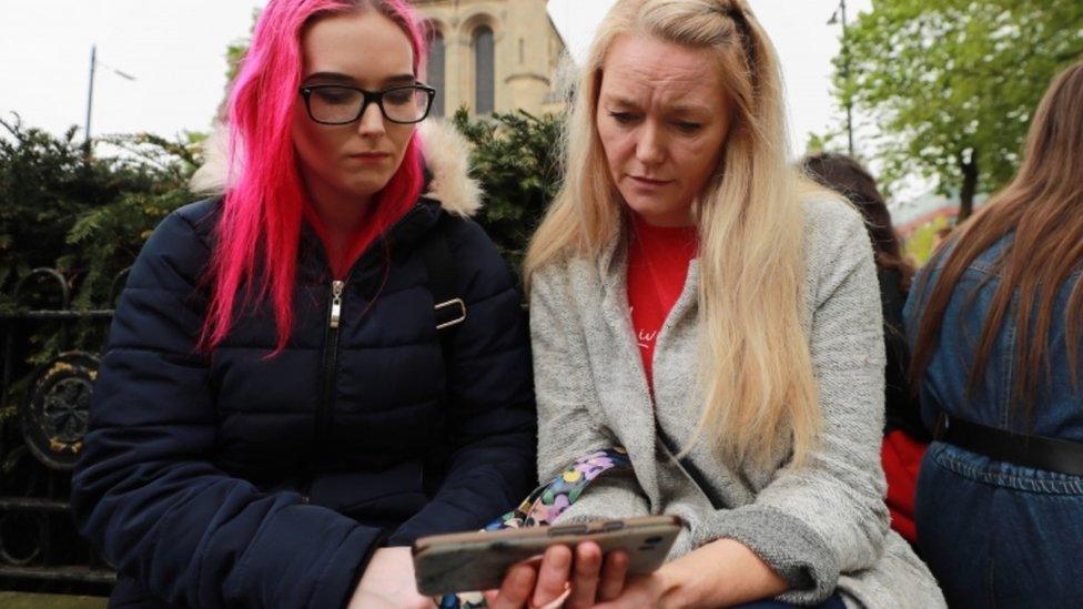 Mourners outside St Anne's Cathedral, Belfast