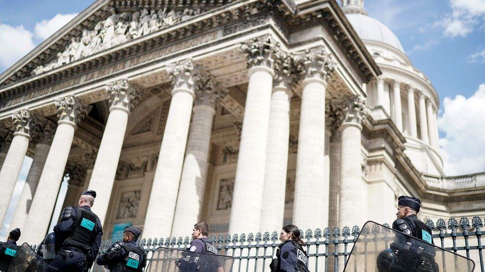 French police officers walk in Panthéon in Paris