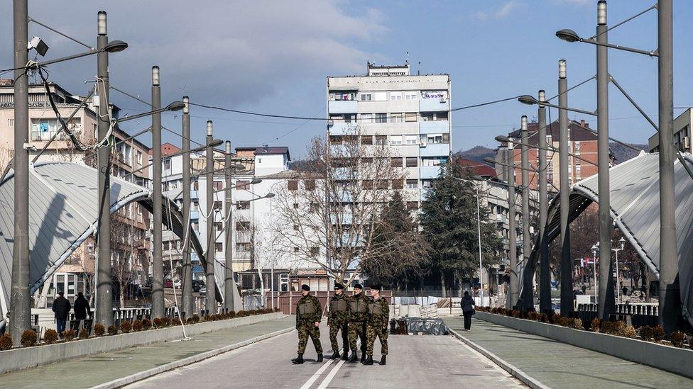 Nato-led peacekeepers on the main bridge in Mitrovica in Feburary 2018