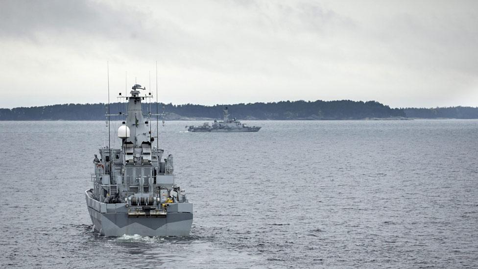 Swedish minesweeper HMS Kullen (L) is engaged in a military operation in the Stockholm Archipelago, Sweden, 19 October 201