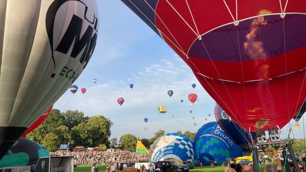 Balloons taking off