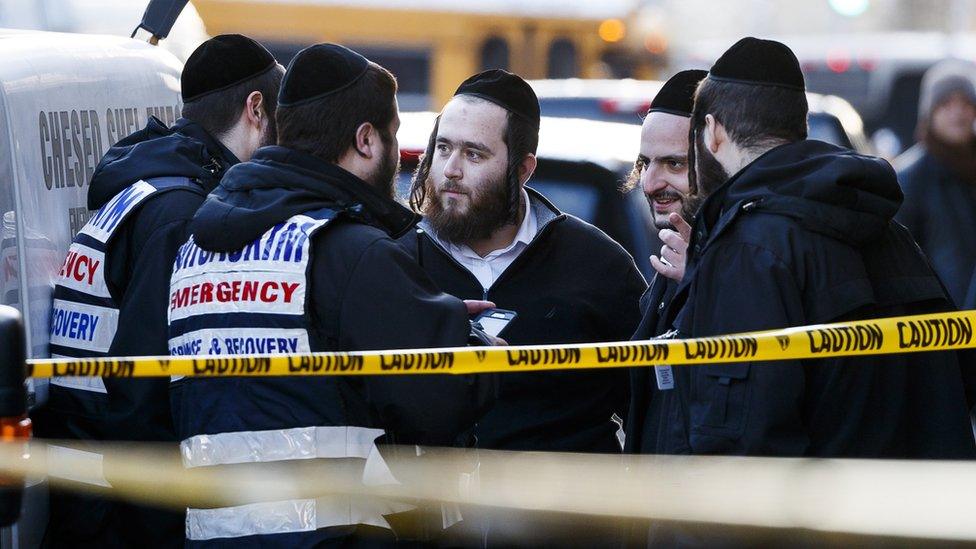 members of Jewish community near the shop