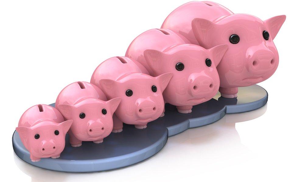 line of piggy banks