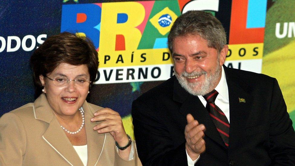 Brazilian President Luiz Inacio Lula da Silva (R) and her new Chief of Cabinet Dilma Rousseff appear during the latter's swearing in ceremony 21 June, 2005 at the Planalto Palace in Brasilia.