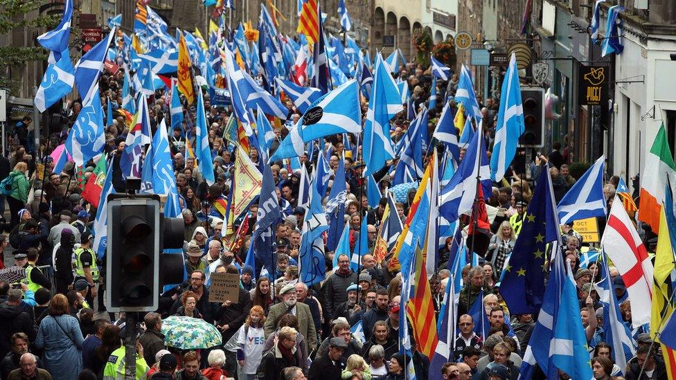 Scottish independence supporters march through Edinburgh during an All Under One Banner march.