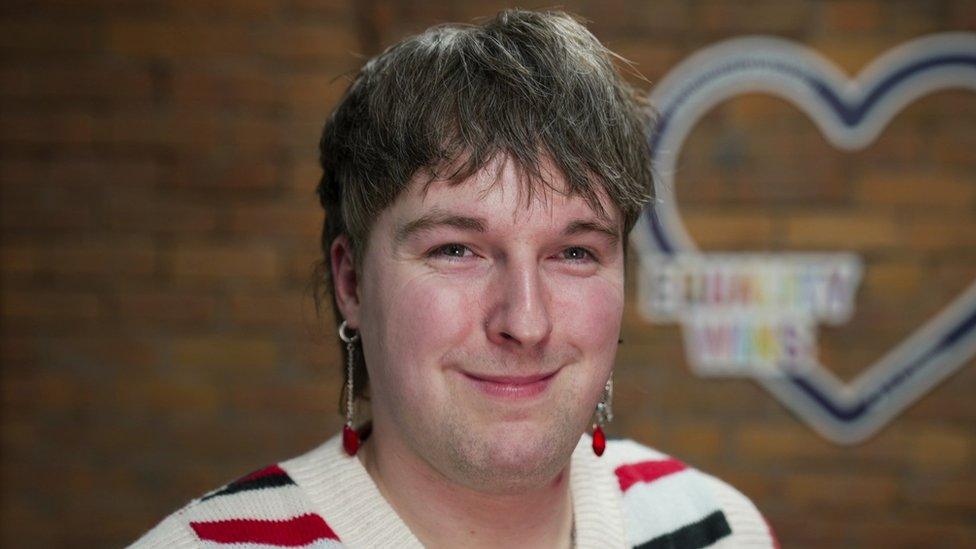 Matthew Belfield, from the LGBT Foundation smiles at the camera