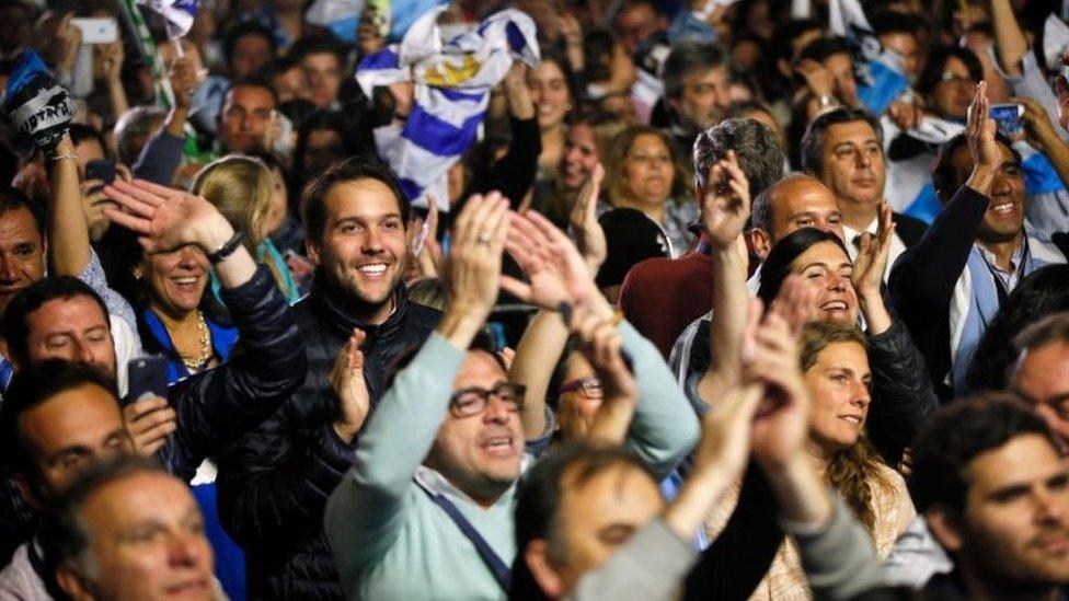 Supporters of National Party presidential candidate Luis Lacalle react after the second-round presidential election