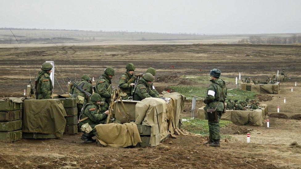 Pro-Russian rebels take part in their military exercises about 30 km from Lugansk, Ukraine