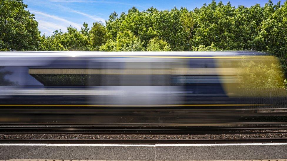 A train passes a station platform