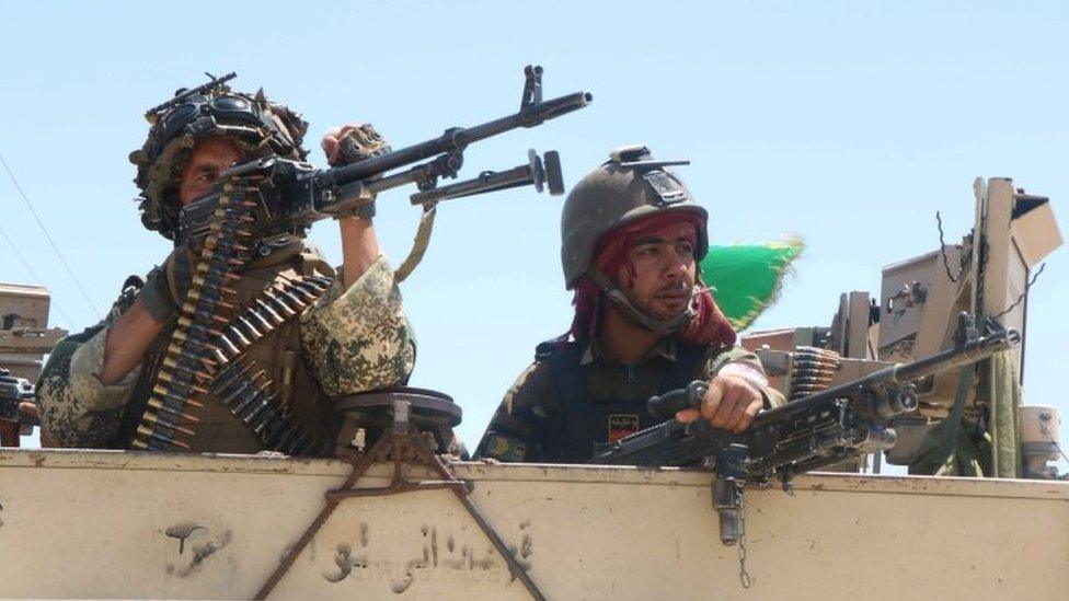 Afghan security forces patrol in Herat