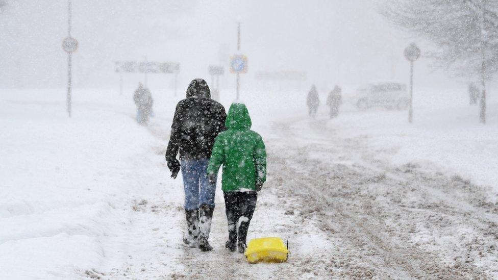 people in snow in balloch