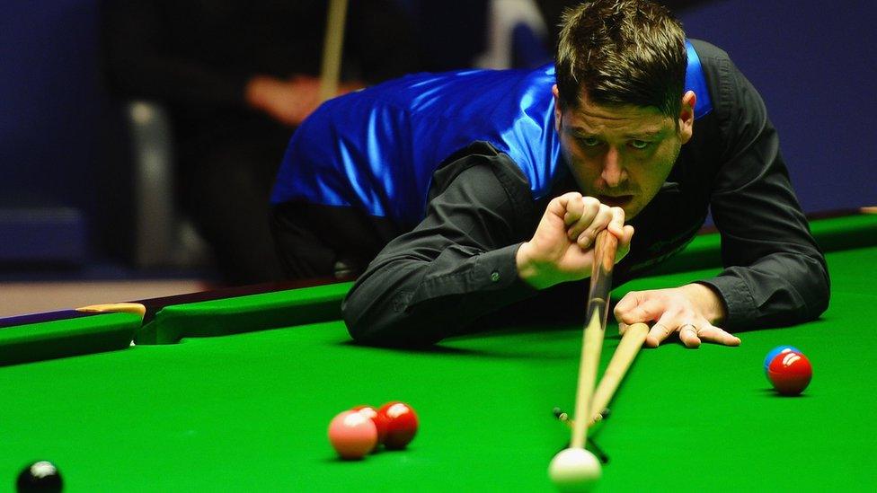 Matthew Stevens plays a shot with his cue