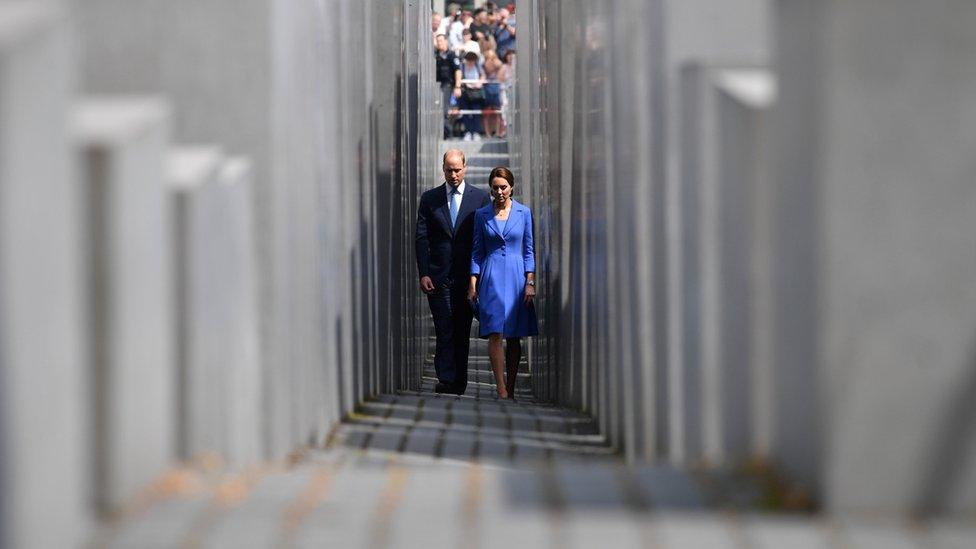 The Duke and Duchess of Cambridge walk through the Memorial to the Murdered Jews of Europe