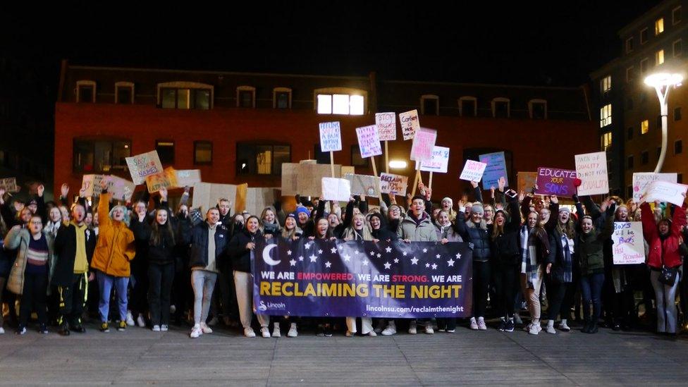 People holding placards