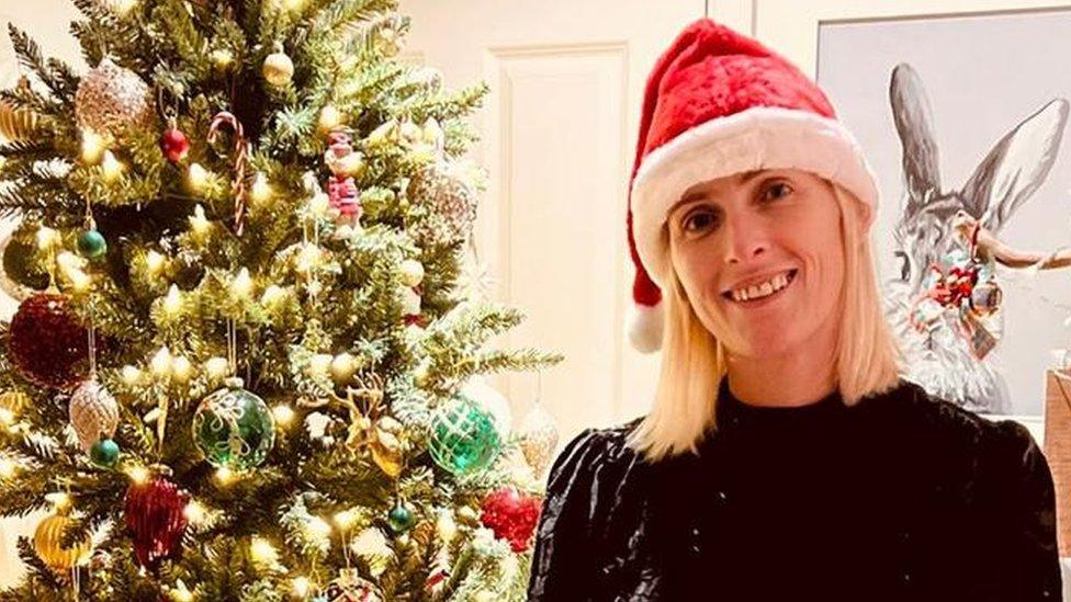 Lisa Woodcock with Christmas tree