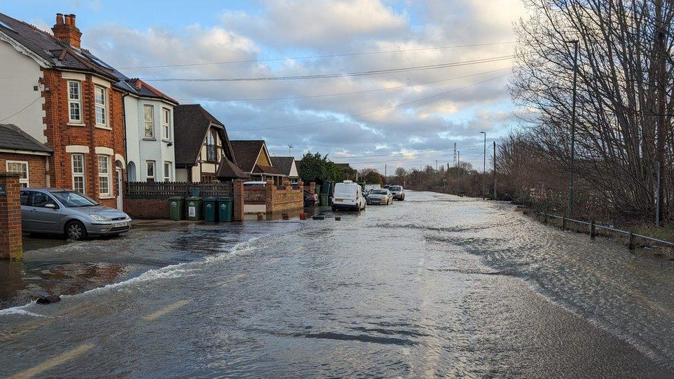 Flooded road near Chertsey Bridge