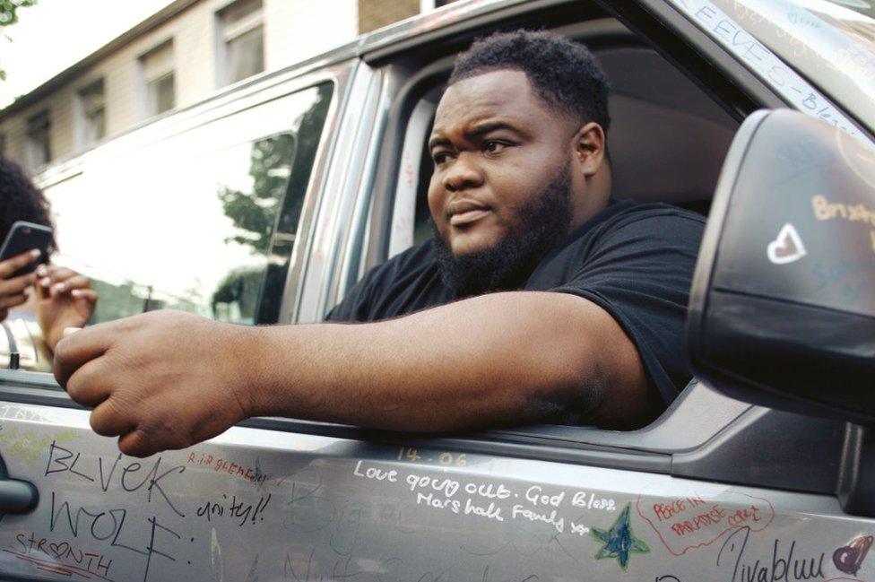 Micah Lammie sitting in car