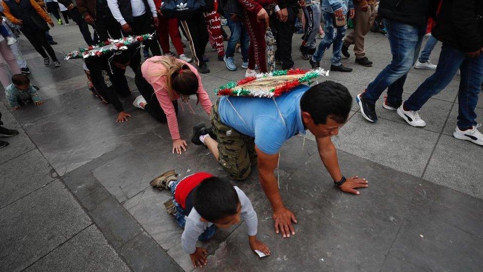 Pilgrims arrive at the Basilica of Guadalupe in Mexico City, Mexico, 11 December 2023. T