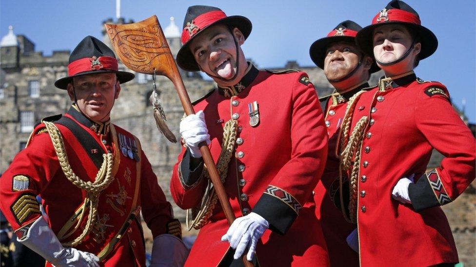 Members of the New Zealand Army band perform the Haka