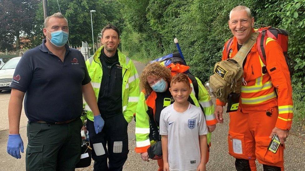 Steve Maddams and Archie, with other medics who came to his aid from the ambulance service and air ambulance