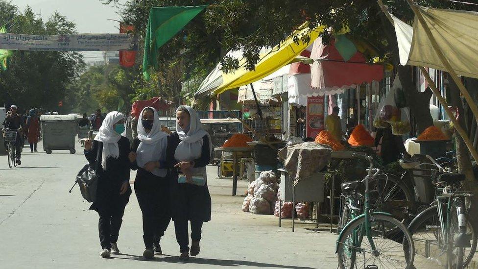 Girl travelling to school in Afghanistan