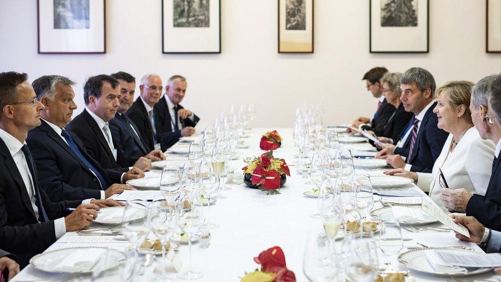 Viktor Orban, prime minister of Hungary (second left), and Angela Merkel, chancellor of Germany (second right) meet on the 30th anniversary of the Pan-European Picnic in Sopron, Hungary