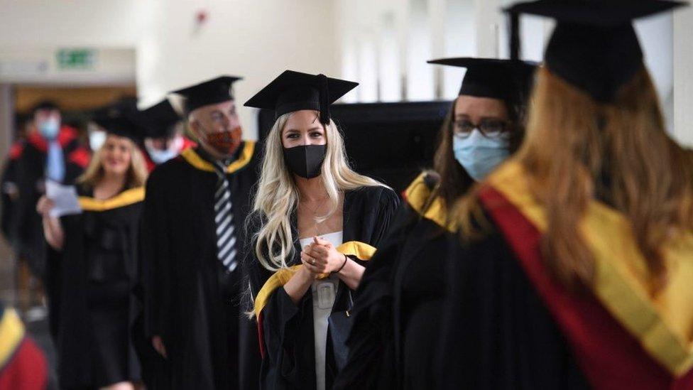 Graduates at a ceremony in Bolton, Lancashire