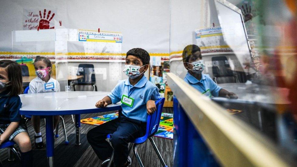 A pupil wears a mask in Miami-Dade County