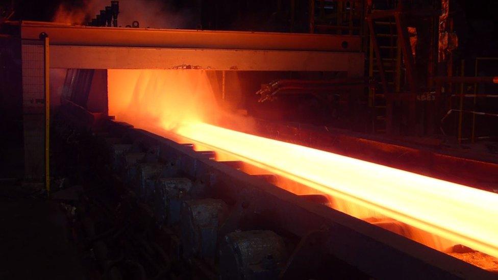 Molten steel going through a mill