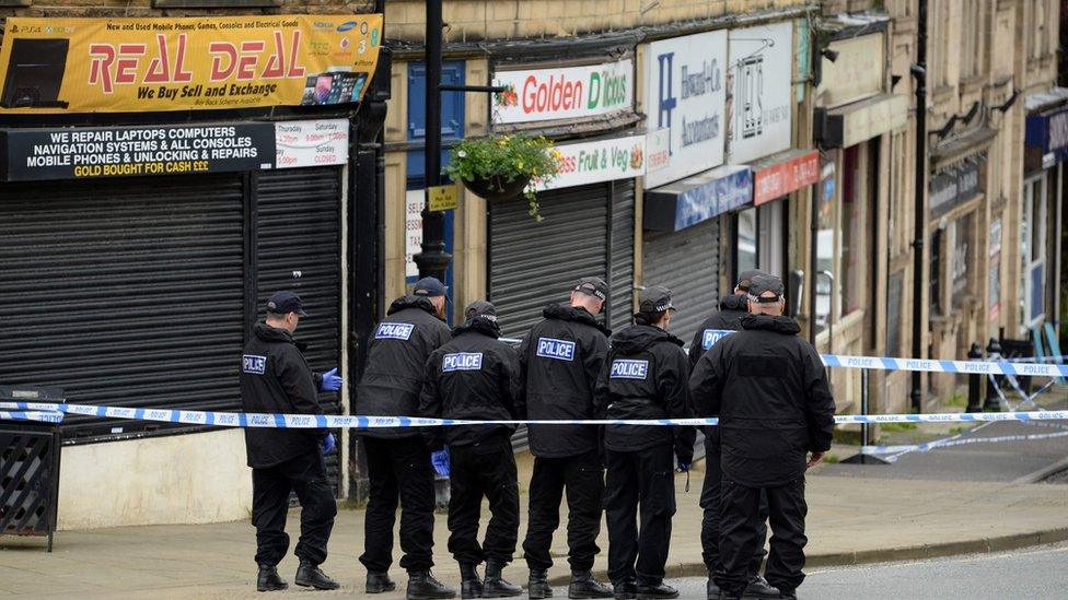 Police examining scene