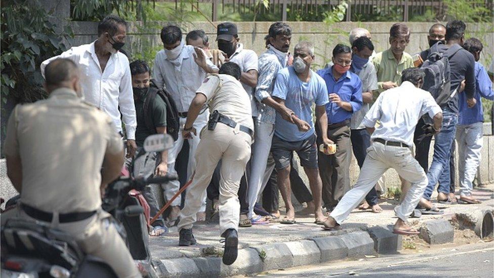 Police had to baton charge unruly queues outside liquor shops