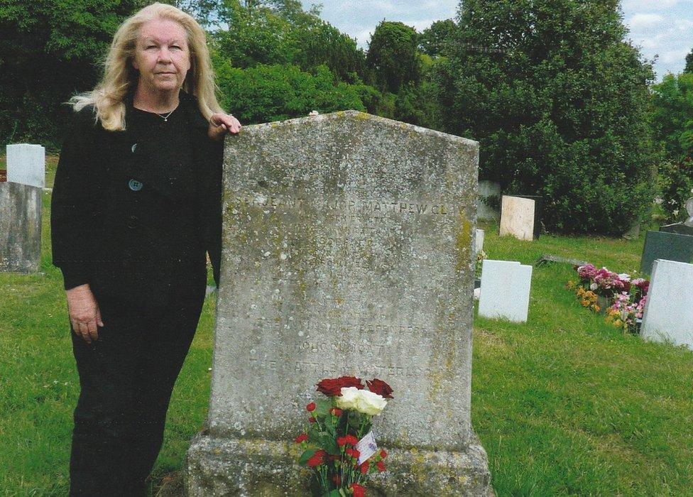 Christine Dabbs with Matthew's grave