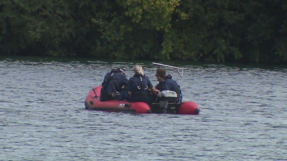 Police officers search Fairlop Waters