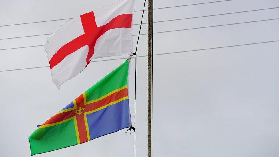 England and Lincolnshire flags fly in Boston