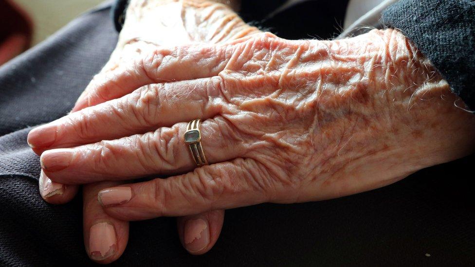 Hands of an elderly woman