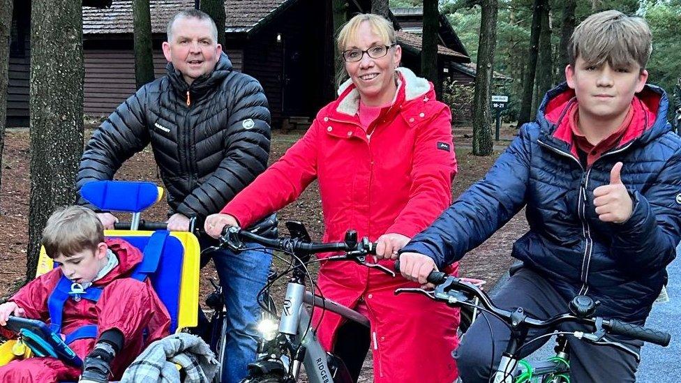 Bedwyr and brother Gethin with parents on bikes